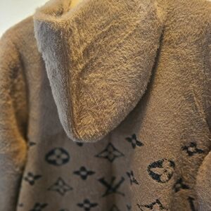 Luxurious Tan Hooded Coat with Black Motif